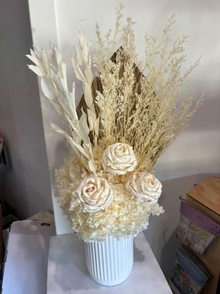 Cream coloured preserved arrangement