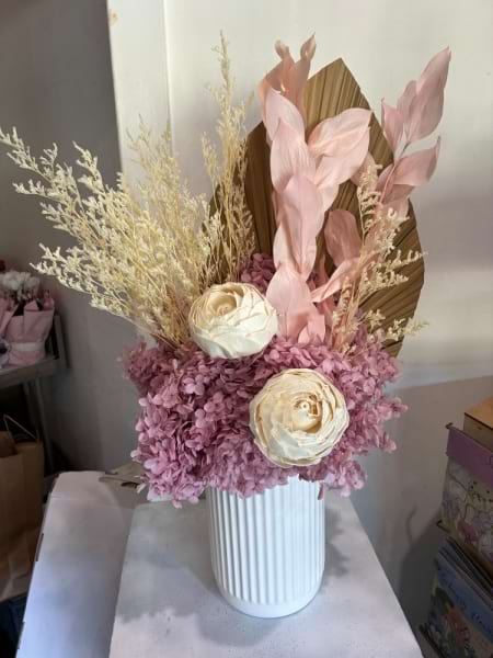 Dusty pinks and cream preserved arrangement